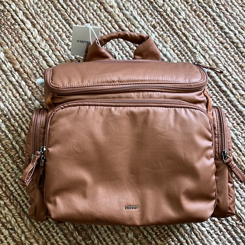 New with tags Caraa diaper bag. Size medium and cotton
